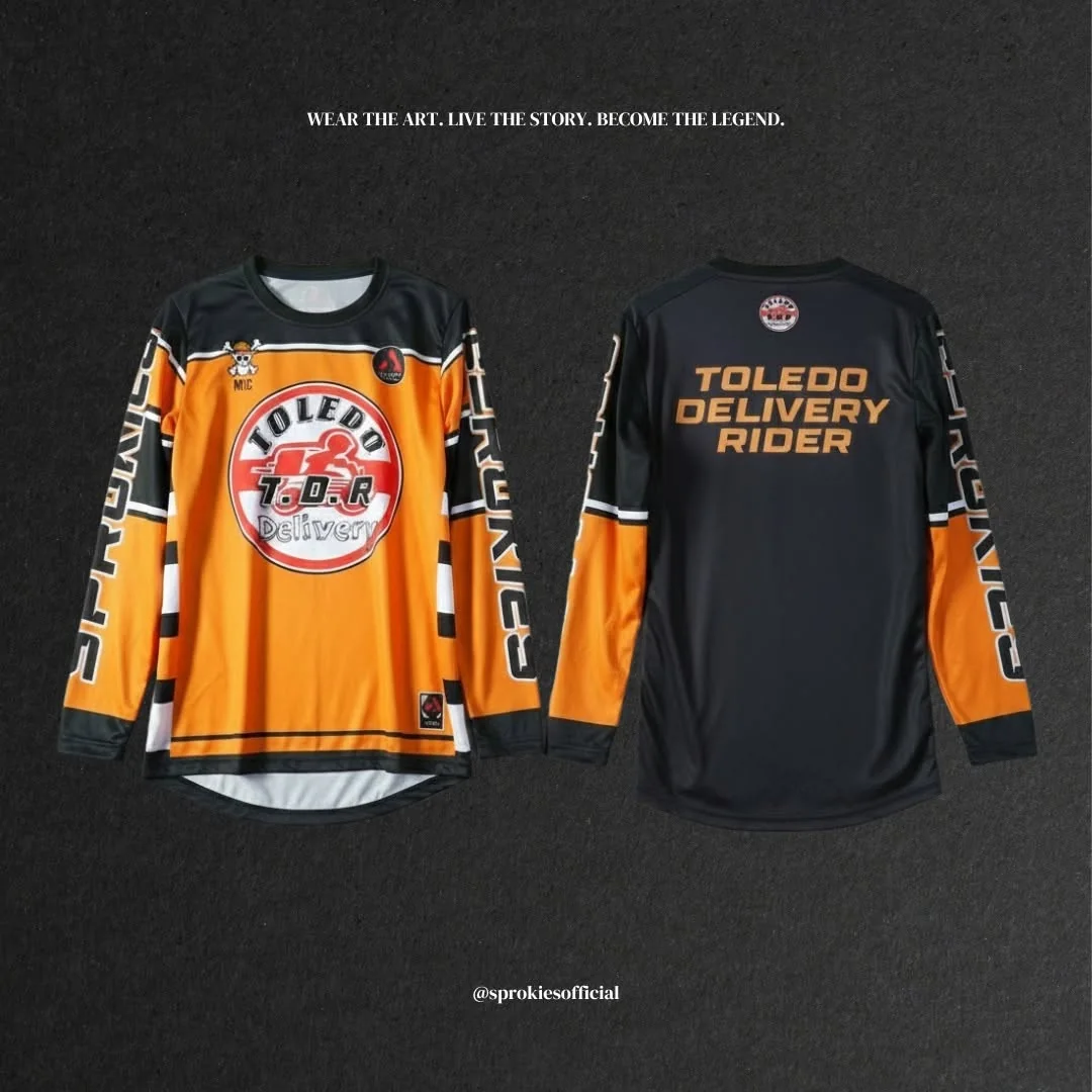 Orange and black custom long sleeve apparel by Sprokies